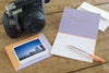 instax Wide pastkarte oranža/violeta